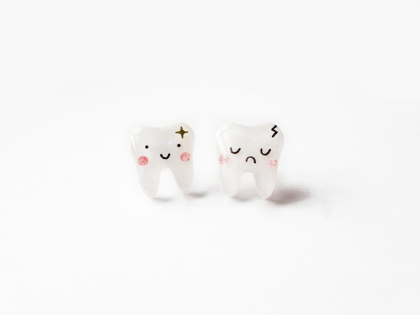 happy teeth and sad teeth mismatched earrings